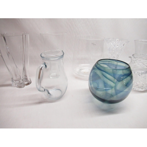 180 - Eight large glass vases and jugs