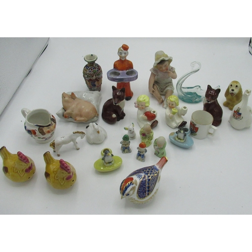 184 - Royal Crown Derby bird paperweight, gold capped, and a collection of small figures