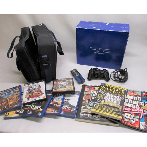 187 - Boxed PS2 and Logik, qty of games and guides