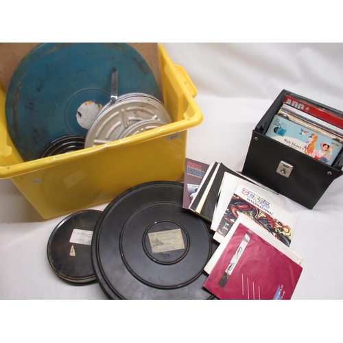 551 - 1980s 45RPM singles in black vinyl case and a collection of vintage home cinema films, some in alumi... 