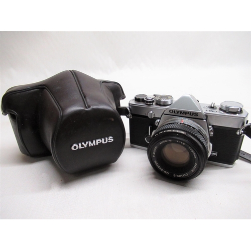 150 - Olympus OM-1 35mm camera with 1:1.8 Olympus lens, serial number 1367490, with Olympus Original Ever ... 