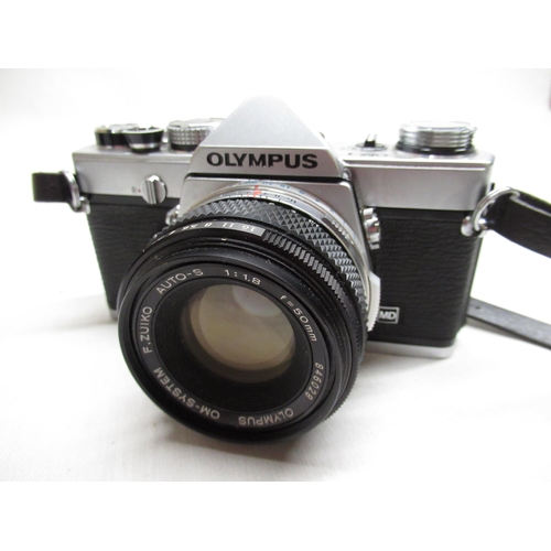 150 - Olympus OM-1 35mm camera with 1:1.8 Olympus lens, serial number 1367490, with Olympus Original Ever ... 