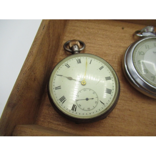 170 - Two Ingersoll pocket watches, a services Army pocket watch, and another pocket watch