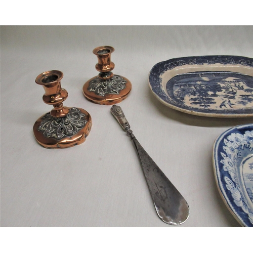 185 - Four pieces of blue and white, two copper candlesticks, shoe horn