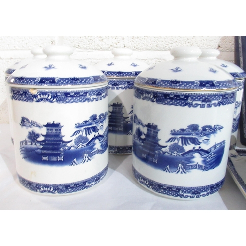 511 - Set of four Willow Pattern tea caddies, Pair of small boxed Willow Pattern Ginger Jars, toast rack, ... 