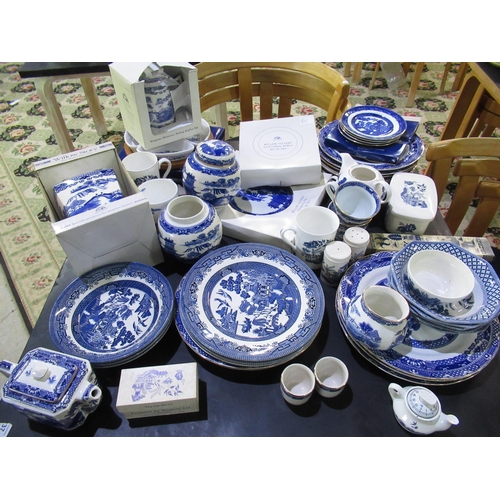521 - Collection of Ringtons and other Blue and White Willow Pattern tableware including plates, salt and ... 