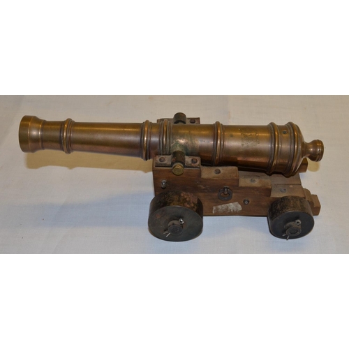 15 - Pair of turned brass model cannons with 10.5