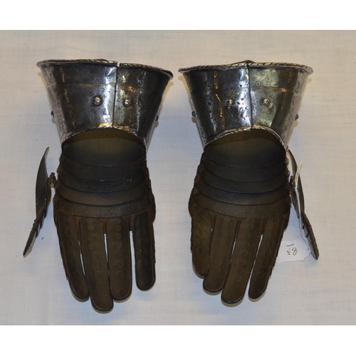 21 - Pair of Italian style C19th steel articulated gauntlets