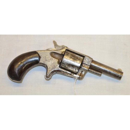 55 - American Invincible .38 rimfire revolver c.1875, with two piece wooden grips, patent date to the bar... 