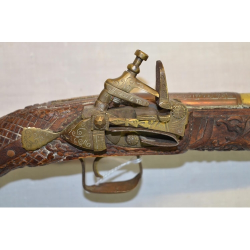 61 - Balkan style Miquelet pistol with brass mounts