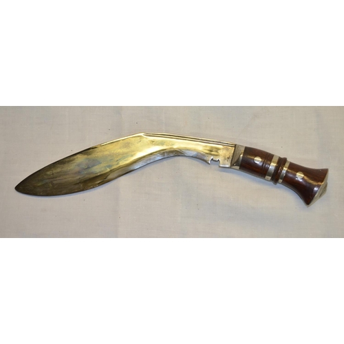 74 - Kukri in leather sheath with rosewood handles and two smaller knives (3)