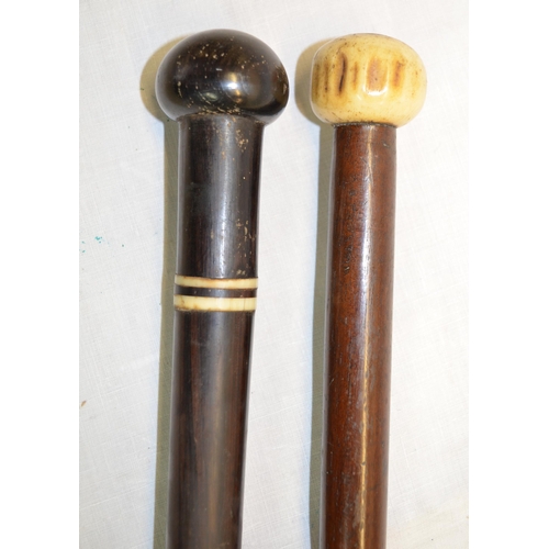 100 - Two African Zulu knobkerries/walking sticks, one with bone knob