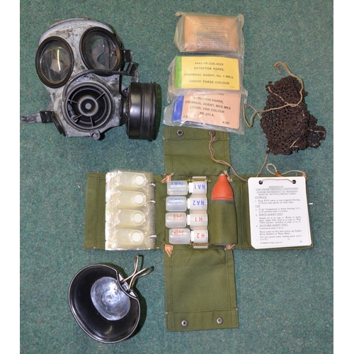 86 - Collection of 1958 pattern British Army webbing and back packs, rolled up NBC smock and trousers, NB... 