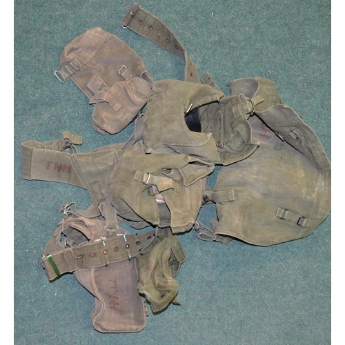 86 - Collection of 1958 pattern British Army webbing and back packs, rolled up NBC smock and trousers, NB... 