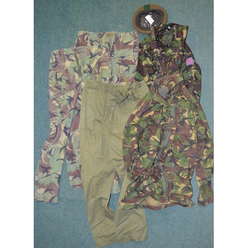 89 - Two British Army field jackets with woodland camo effect, pair of olive green military trousers, two... 