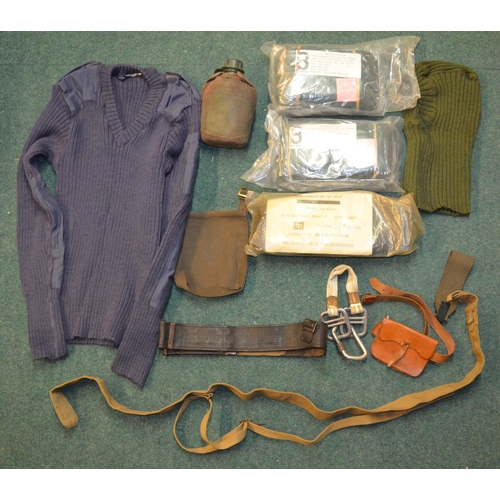 92 - Box containing a number of pieces of military uniform, RAF jersey, vintage WWII style slip, belt, le... 