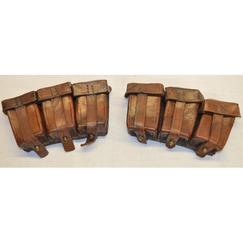 95 - Two sets of three Bandolier mounted cartridge pouches, no belts, brown leather