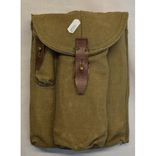 96 - Canvas brown magazine pouch containing three magazine with inert bullets, small gun cleaning set