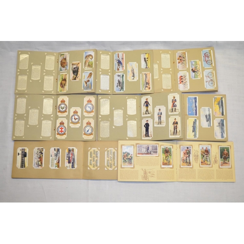 158 - Extensive collection of vintage cigarette cards, includes a number of completed albums, covering a w... 