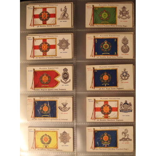 172 - Folder containing a comprehensive and varied collection of cigarette cards incl. Players regimental ... 