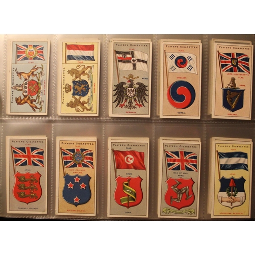 172 - Folder containing a comprehensive and varied collection of cigarette cards incl. Players regimental ... 