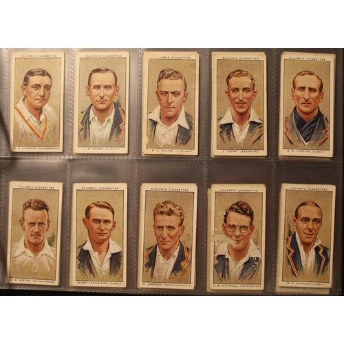 172 - Folder containing a comprehensive and varied collection of cigarette cards incl. Players regimental ... 