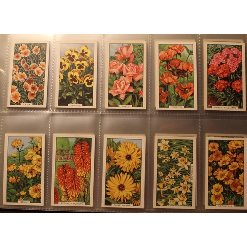 174 - Folder containing a comprehensive collection of cigarette cards incl. Gallagher 1938 garden flower t... 