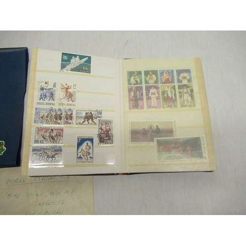 781 - Small stamp album with various stamps from Romania, USA, The Olympics etc.