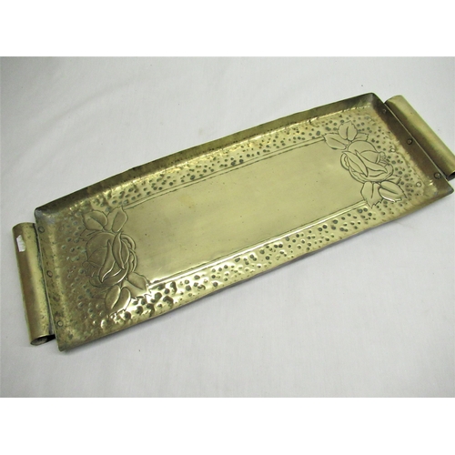 112 - Arts & Crafts twin handled brass tray with hand hammered decoration and riveted handles W66cm D23cm