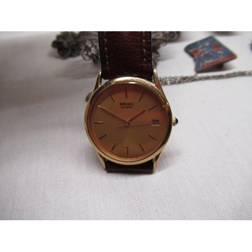 211 - 1964 Butlin Beavers Club badge, Seiko quartz wristwatch in gold plated case, three other quartz wris... 