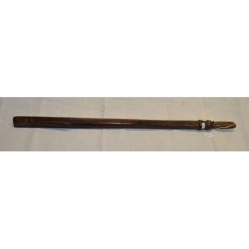 300 - Solomon Islands type wooden club with carved elongated face, traces of old ink written markings L90c... 