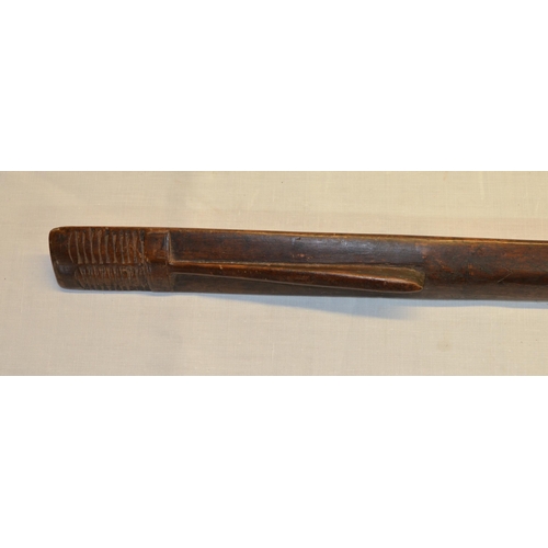 300 - Solomon Islands type wooden club with carved elongated face, traces of old ink written markings L90c... 