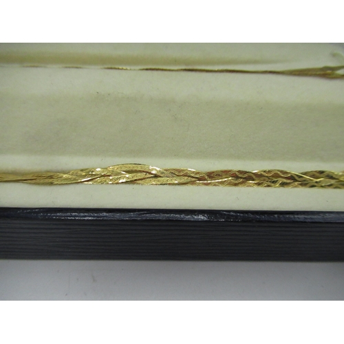 20 - 9ct yellow gold plaited necklace and bracelet set both stamped 9KT ITALY, 7.2g