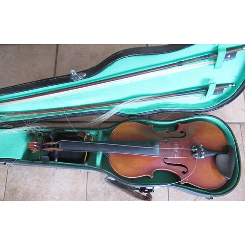 87 - Cased violin and two bows (A/F) with accessories and one piece back