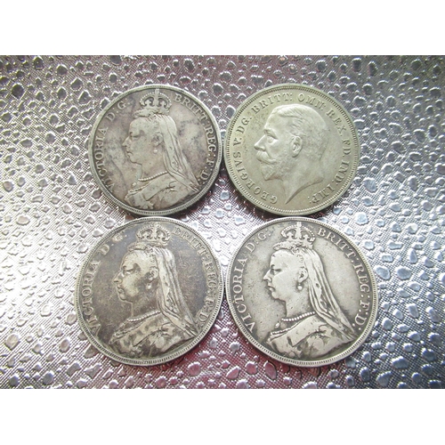 45 - Victorian 1890 silver crown, two Victorian 1889 silver crowns, Geo. V 1935 crown (4)