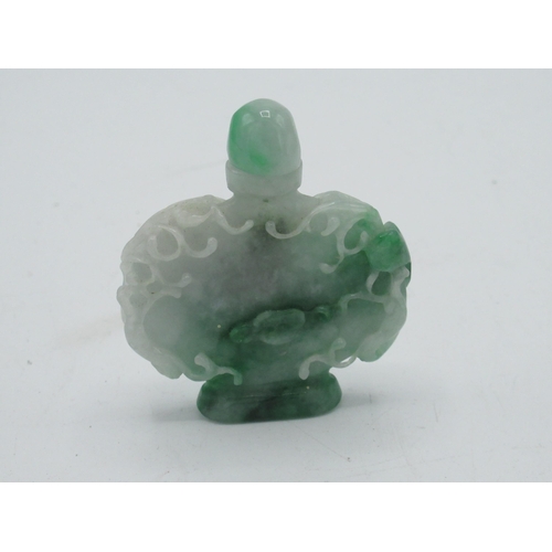515 - C20th carved jade scent bottle decorated with single five petal flower and foliage and screw off lid... 