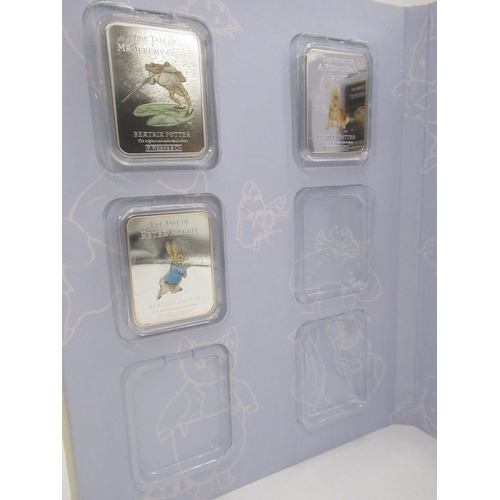 743 - The World Of Peter Rabbitn Ingot Collection including nine silver plated bars in fitted case