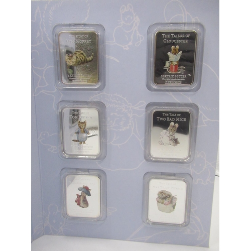 743 - The World Of Peter Rabbitn Ingot Collection including nine silver plated bars in fitted case