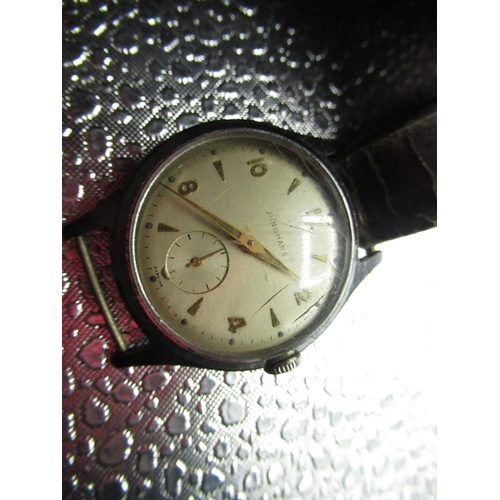 603 - Junghans hand wound wristwatch, chrome plated case on brown leather strap, snap on stainless steel c... 
