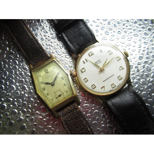 604 - 1960s Smith's hand wound wristwatch, gold plated case on black leather strap, with original Smith's ... 