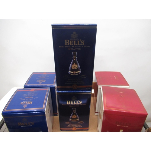 808 - Four Bells Whisky Christmas decanters and two ER.II 50 year anniversary decanters, all complete with... 