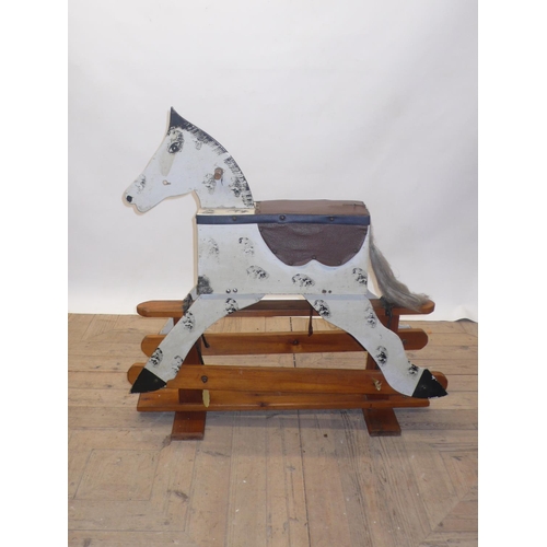 217 - Mid to late C20th painted wood rocking horse, H94cm