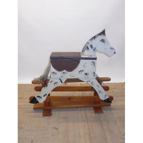 217 - Mid to late C20th painted wood rocking horse, H94cm