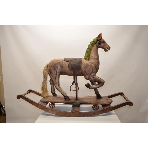 219 - Reproduction carved Victorian style rocking horse