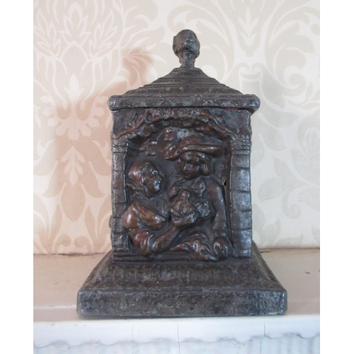 2100 - C19th square cast lead tobacco box, the sides decorated with courting couples, the stepped tapering ... 