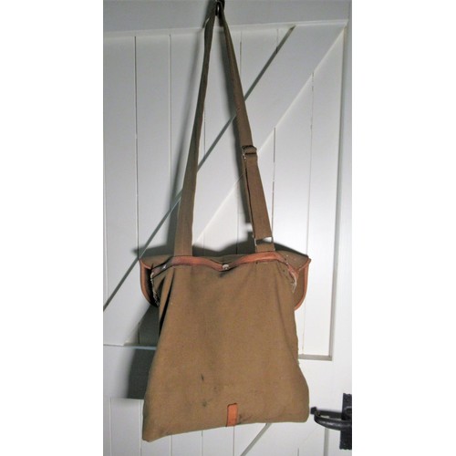 2108 - Leather trimmed green canvas game bag containing game net, a wooden and antler handled skinning knif... 