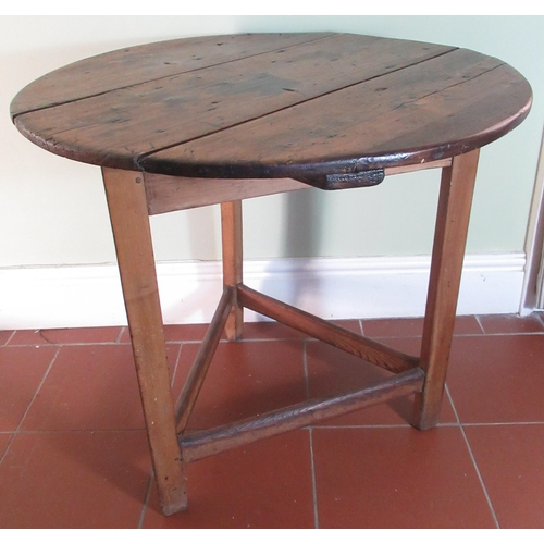 2062 - C19th pine cricket table, planked circular top on three triangular supports joined by a plain stretc... 