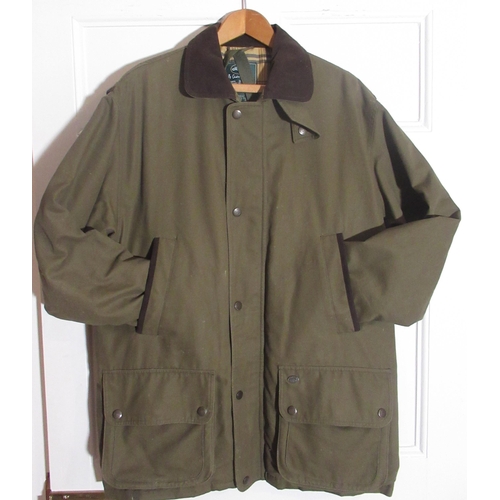 2081 - Le Chameau green proofed cotton shooting jacket with brown suede collar, hand warmer pockets and fly... 