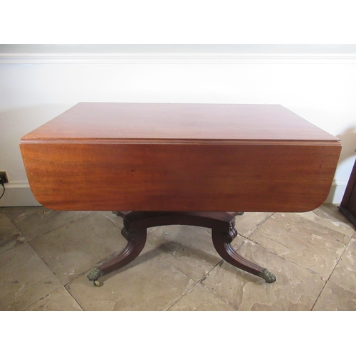 2005 - Regency mahogany pedestal Pembroke table, with end drawer and two fall leaves on angular baluster co... 