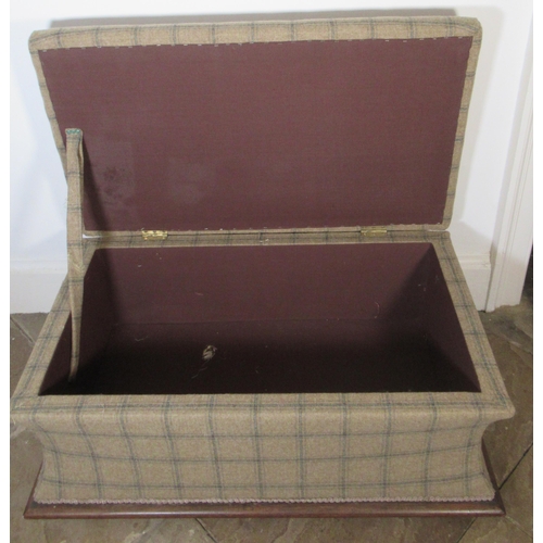 2008 - Edwardian ottoman, with hinged padded top on mahogany plinth with brass sockets and casters, all ove... 